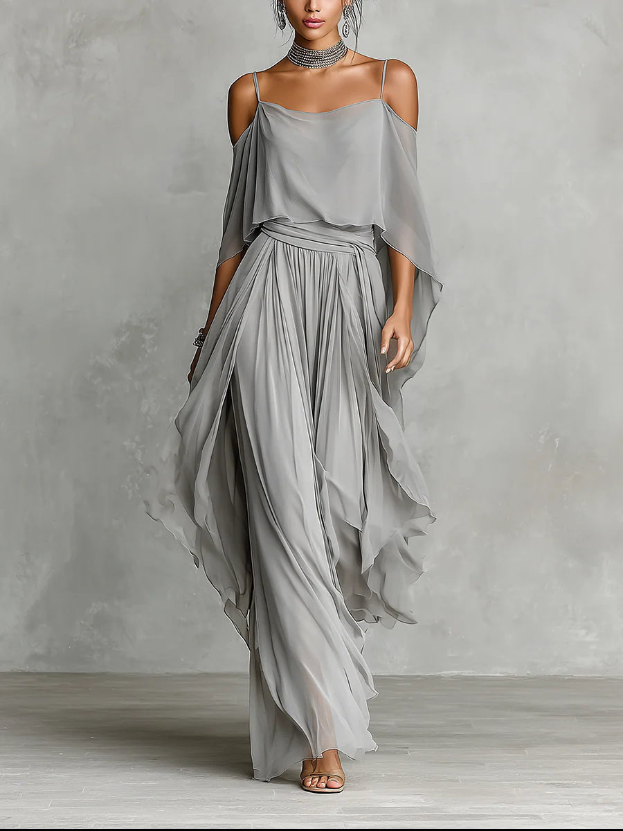 Set in grey chiffon with a fluid tank top and off-the-shoulder trousers