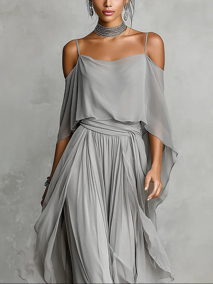 Set in grey chiffon with a fluid tank top and off-the-shoulder trousers