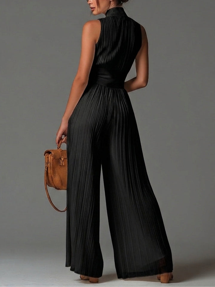 Black sleeveless jumpsuit with V-neck, zip, pleated and wide-leg in chiffon